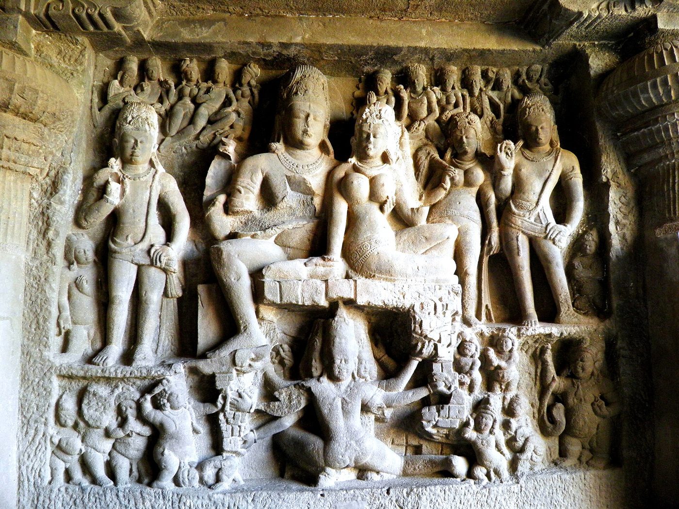 Ravana shaking Kailasa — the demon king's wheel of arms beneath the mountain, Shiva still above.