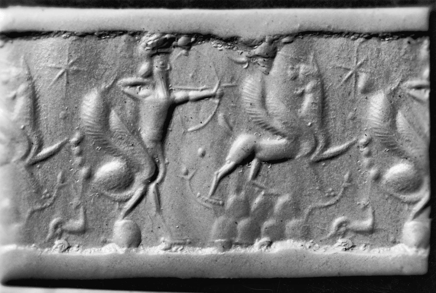 Cylinder seal with scorpion-man archer, Walters Art Museum