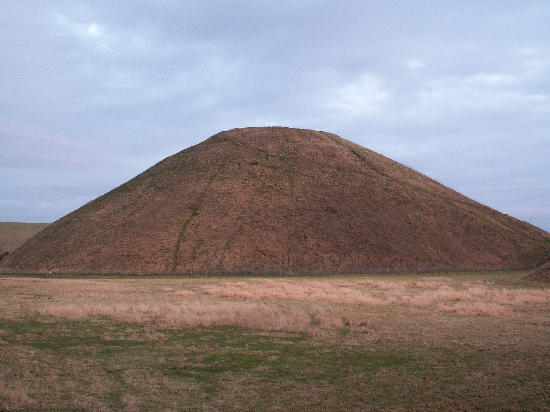 Silbury Hill — the largest prehistoric mound in Europe, raised for a reason we still don't have.