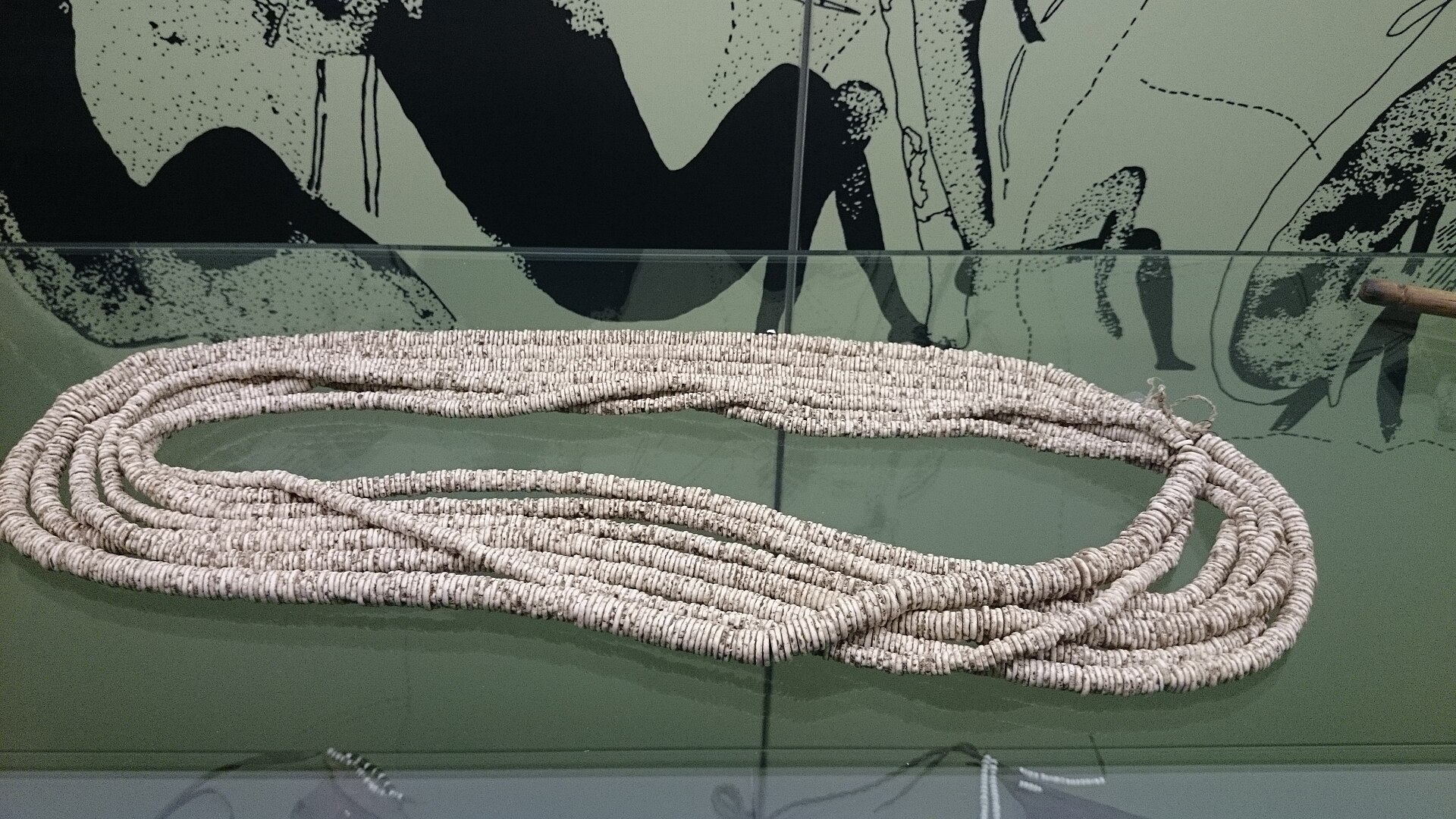 Ostrich-eggshell beadwork — wealth that is given away.