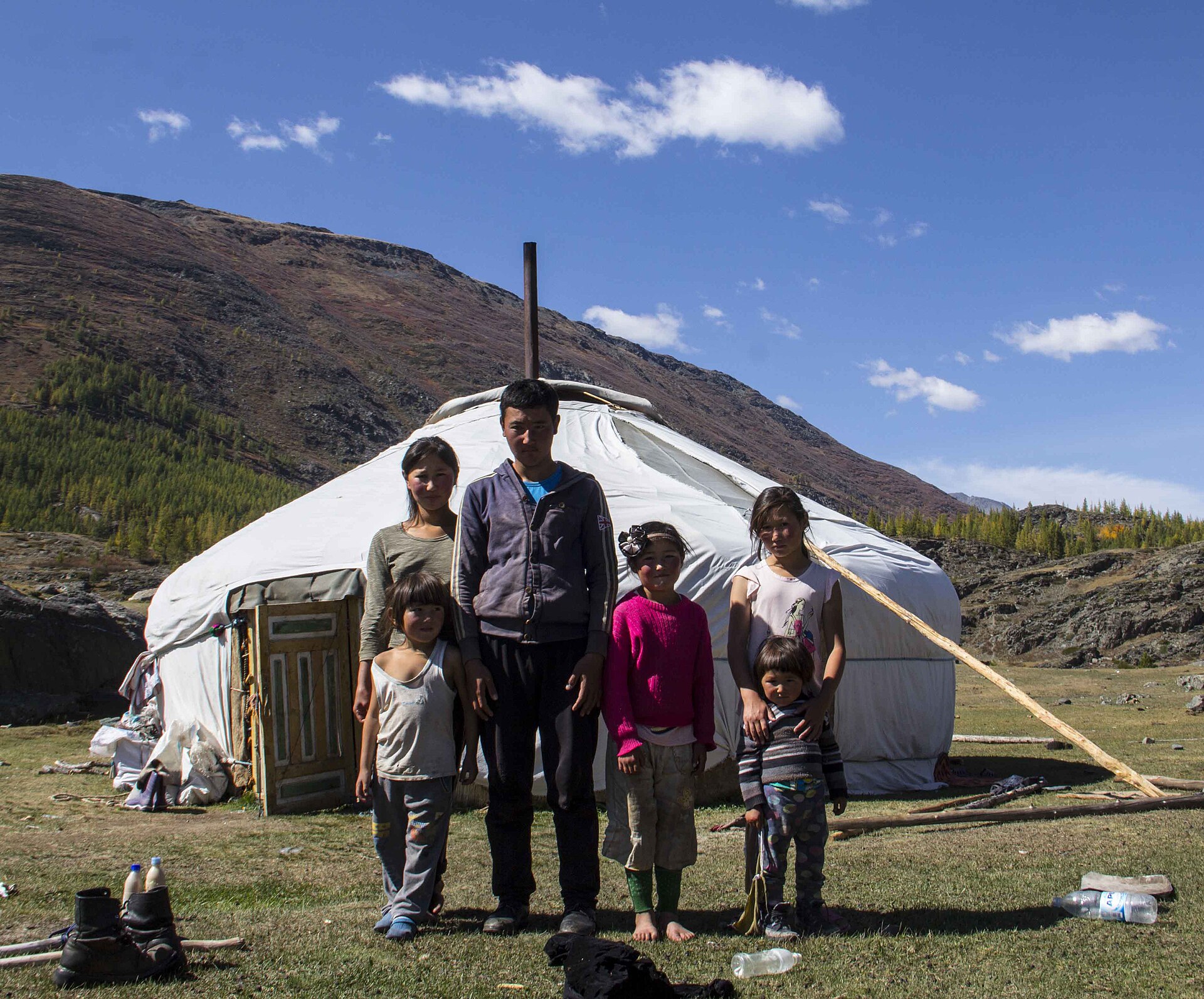A herder in the deel — the expert fighting to hand the life on, not a vanishing relic.
